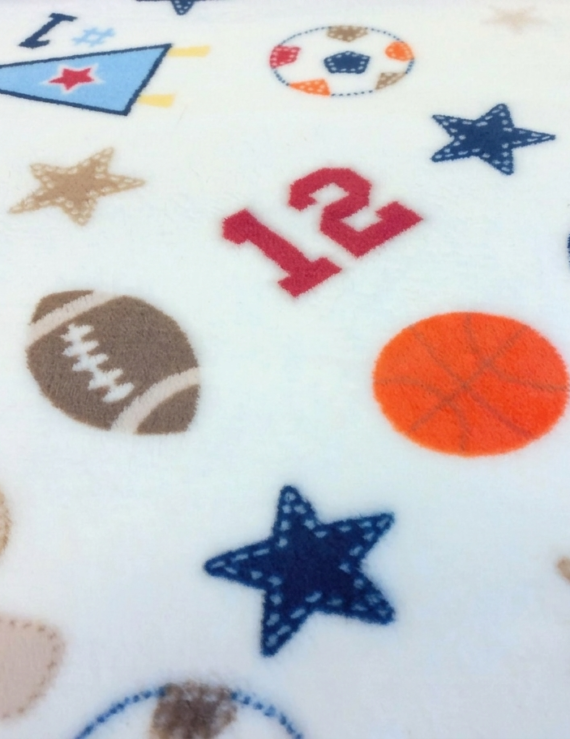 Wellsoft Winterstoffmuster in Creme mit beigen Ballmotiven